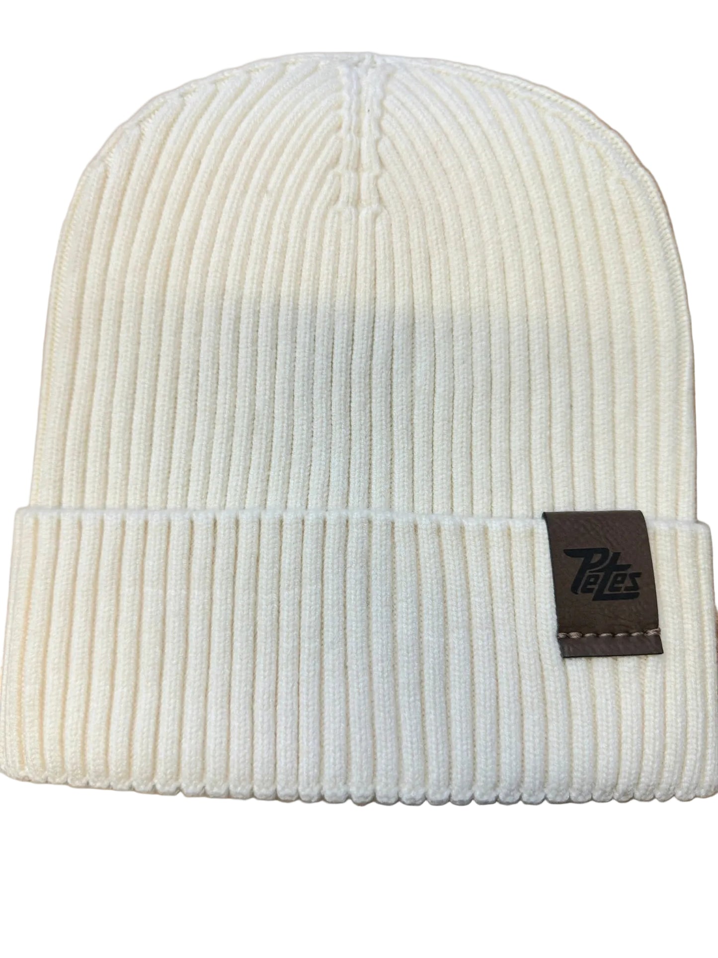 White beanie with a laser etched Petes brown leatherette label