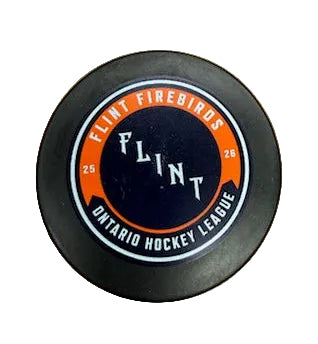 Hockey puck with 'Flint Firebirds' and 'Ontario Hockey League' branding 