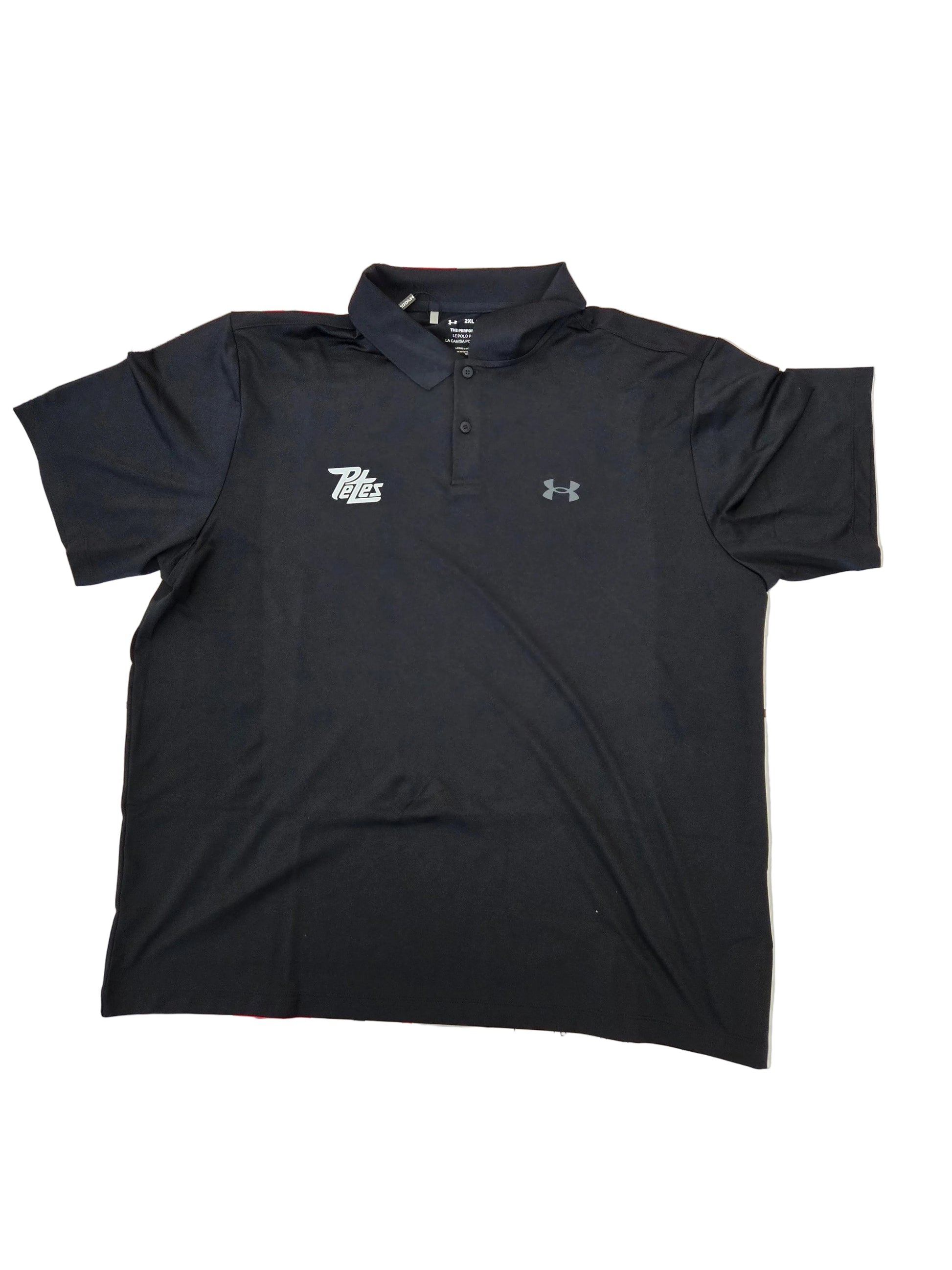 Black polo shirt on a tiled floor with visible branding